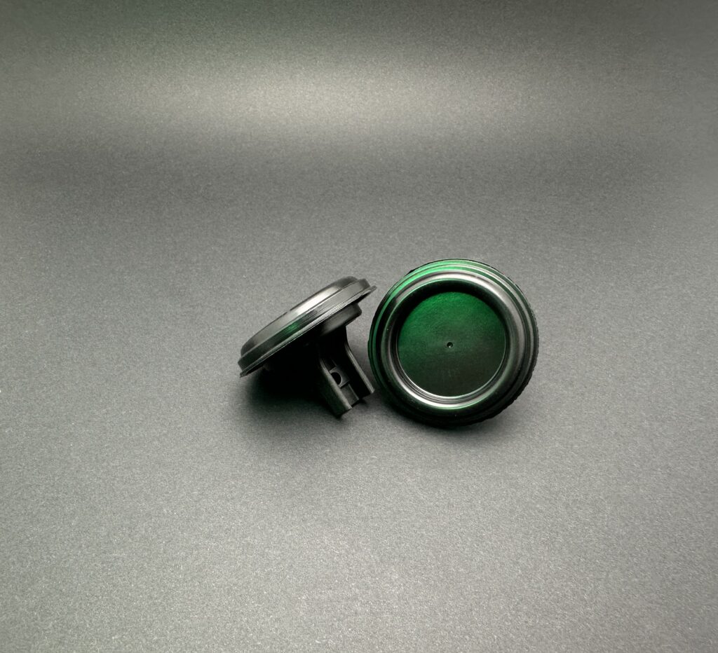 Membran aus Gummi und Kunststoff mit runder Geometrie.