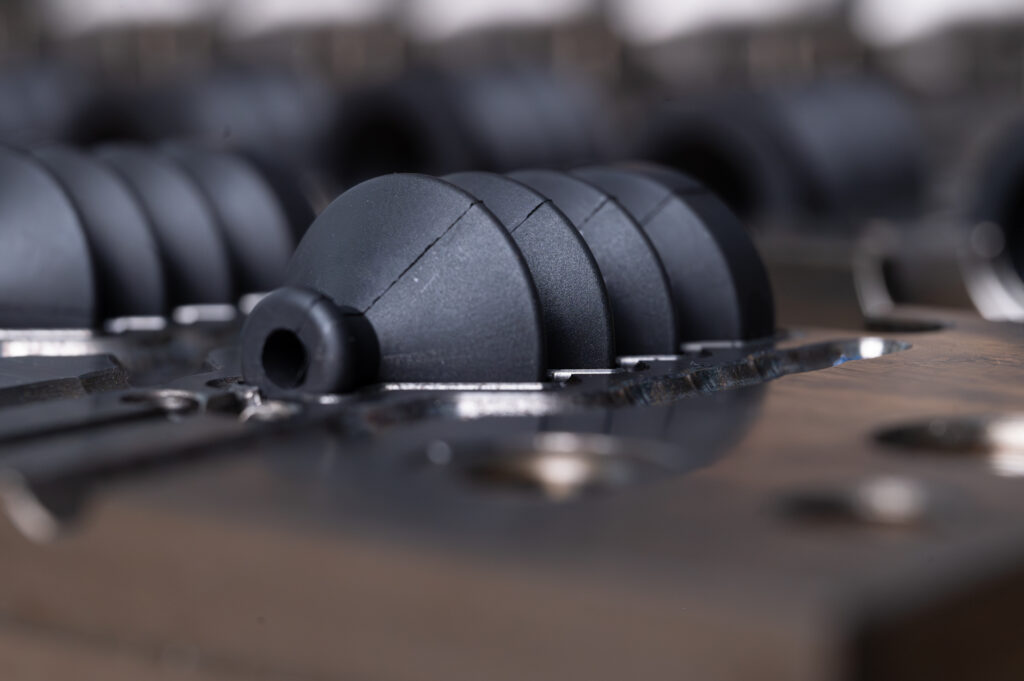 Schwarze Gummiformteile - Dämpfer